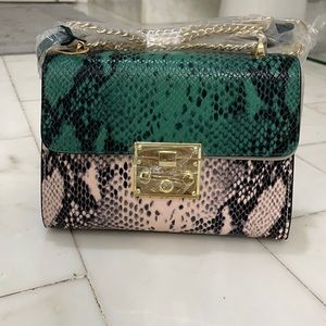 Animal print crossover bag. NWT